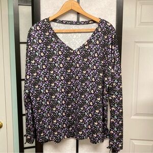 NWOT Plus size top (see measurements). Tags removed. Poly. Open sleeves.